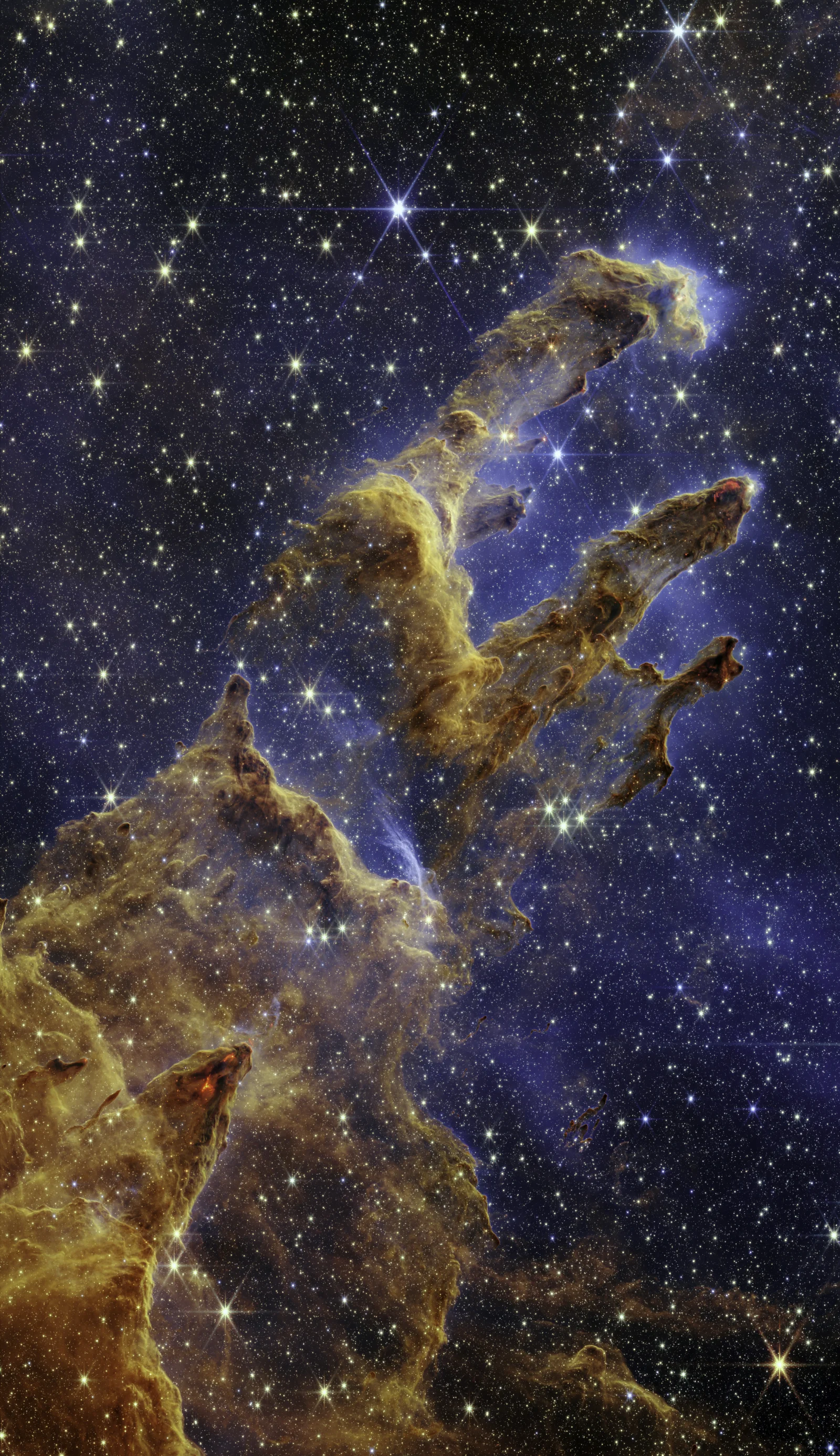 James Webb Space Telescope가 2022년에 근적외선으로 포착한 창조의 기둥.