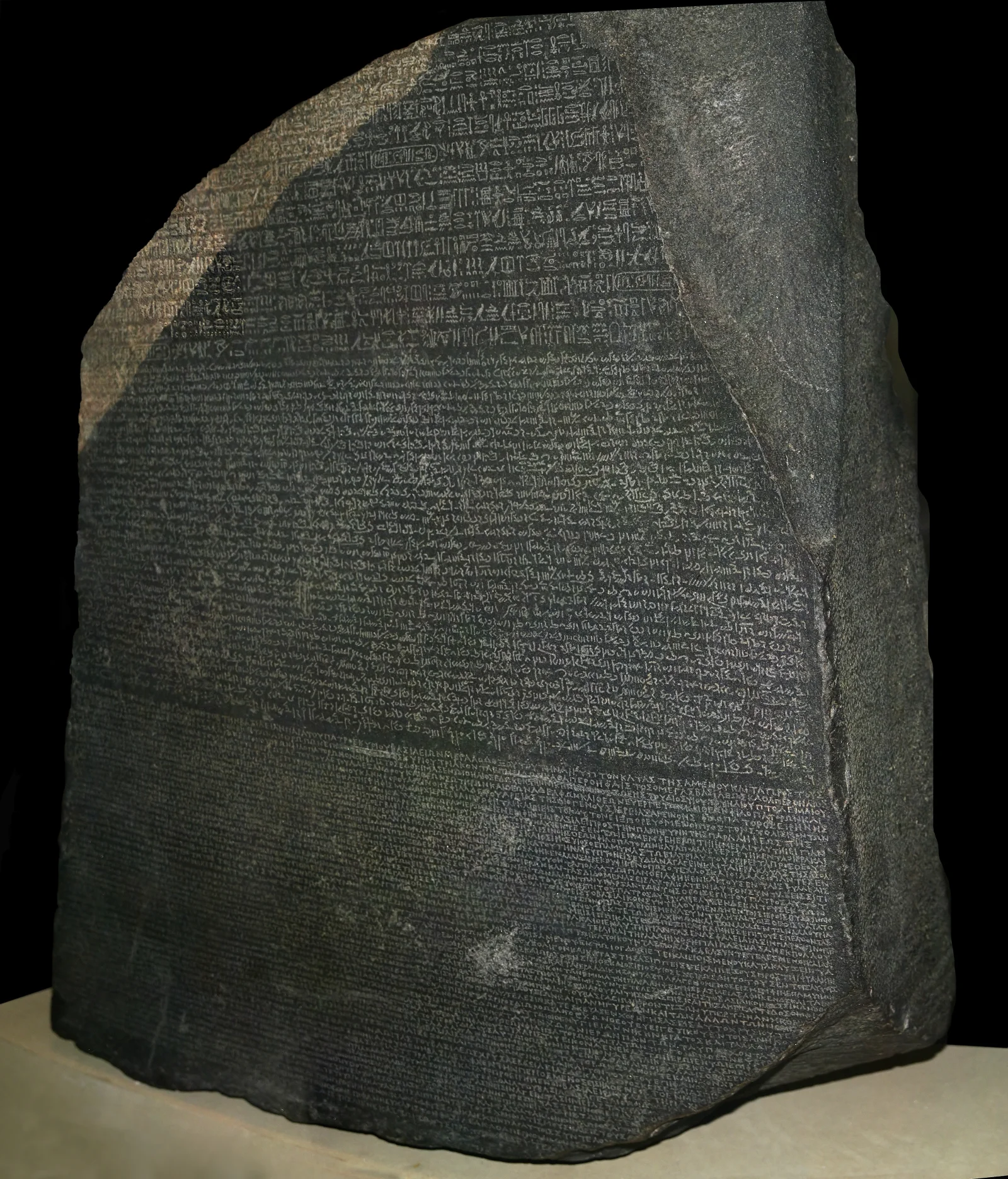 The Rosetta Stone, inscribed in hieroglyphic, Demotic, and ancient Greek, 196 BC.